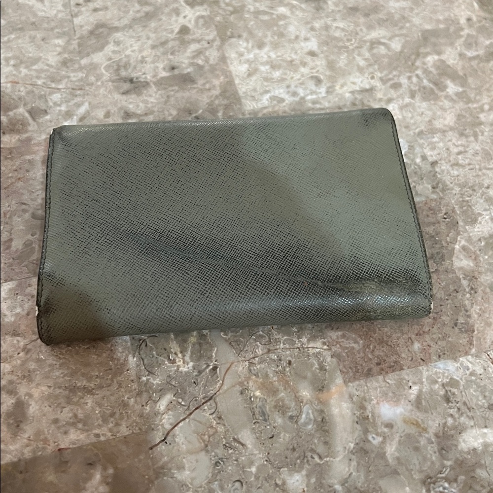 Prada olive Leather Wallet. Lots of life left 
GUC. Leather is in good shape - Picture 2 of 12